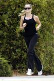 Reese Witherspoon jogging around the streets of Brentwood
