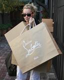 th_44670_Preppie_-_Ashley_Tisdale_shopping_at_Christian_Louboutin_in_Beverly_Hills_-_Dec._8_2009_133_122_256lo.jpg
