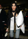th_89303_celebrity-paradise.com-The_Elder-Kim_Kardashian_2010-01-18_-_At_LAX_029_122_72lo.jpg
