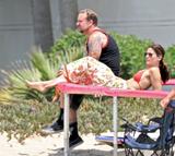 Sandra Bullock in bikini top and husband host an Independence Day beach party, Los Angeles