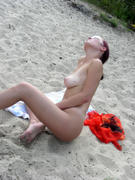 Nude girl posing on the beach-x38v3io1cz.jpg